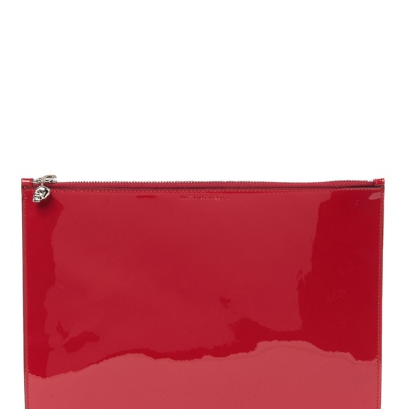 red patent leather clutch bag